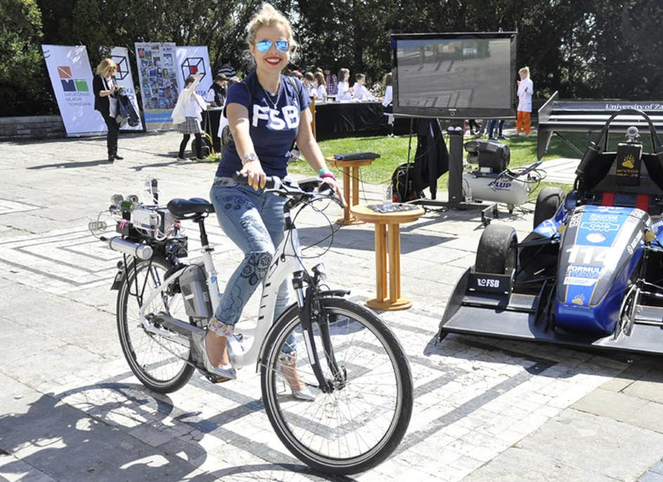 Ankica Kovac, riding her hydrogen powered electric cycle